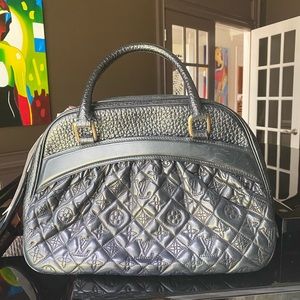 Black lambskin vintage Louis Vuitton.